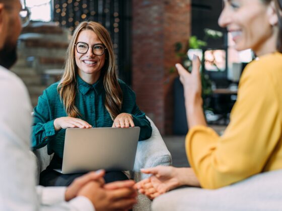 Hotel manager reviewing corporate travel data via GDS platform